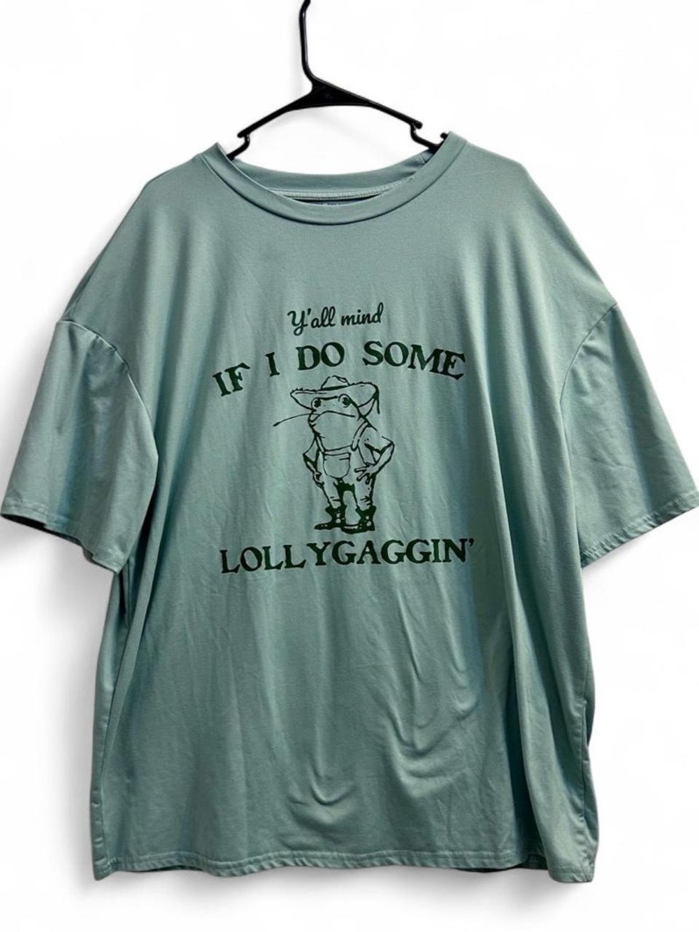Green farmer frog graphic tee